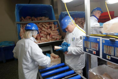 Pig trotters are being prepared for export at a packing plant. They are in high demand in China. Photo: Bert Jansen